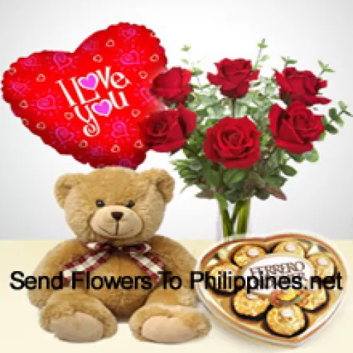 6 Roses rouges avec quelques fougères dans un vase en verre, un mignon ours en peluche brun de 14 pouces de haut, 8 chocolats Ferrero Rocher en forme de cœur et un ballon "Je t'aime"