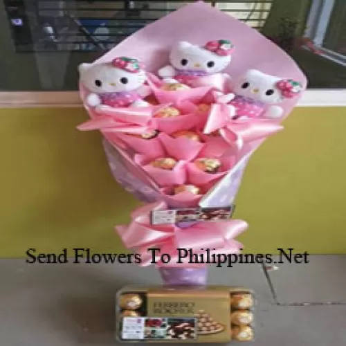A Beautiful Hello Kitty Teddy Bear Bouquet With Fererrero Rochers In The Same Bouquet And A Box Of 30 Pcs Ferrero Rochers