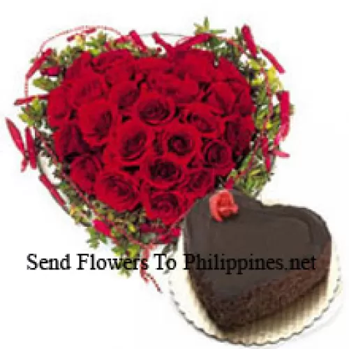 Heart Shaped Arrangement Of 40 Red Roses Along With 1 Kg Heart Shaped Chocolate Cake (Please note that cake delivery is only available for Metro Manila Region. Any cake delivery orders outside Metro Manila will be substituted with Chocolate Brownie Cake without cream or the recipient shall be offered a Red Ribbon Voucher enough to buy the same cake)