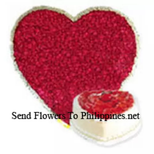 Heart Shaped Arrangement Of 200 Red Roses Along With Heart Shaped Pineapple Cake (Please note that cake delivery is only available for Metro Manila Region. Any cake delivery orders outside Metro Manila will be substituted with Chocolate Brownie Cake without cream or the recipient shall be offered a Red Ribbon Voucher enough to buy the same cake)
