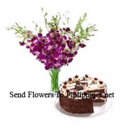 Orchids In A Vase Along With 1 Kg Black Forest Cake (Please note that cake delivery is only available for Metro Manila Region. Any cake delivery orders outside Metro Manila will be substituted with Chocolate Brownie Cake without cream or the recipient shall be offered a Red Ribbon Voucher enough to buy the same cake)