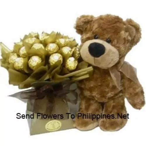 A Cute 14 Inches Tall Brown Teddy Bear And A Bouquet which is beautifully wrapped with 24 delicious Italian made chocolate Ferrero Rocher which has pistachio, crunchy titbits almond and whole pistachios in it