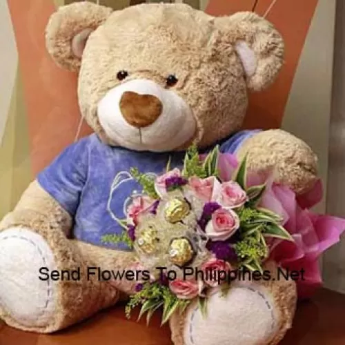 A Cute 24 Inches Tall Brown Teddy Bear And A Bouquet which is beautifully wrapped with 12 Pink Roses And 3 delicious Italian made chocolate Ferrero Rocher which has pistachio, crunchy titbits almond and whole pistachios in it