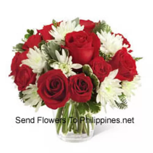 This Bouquet is a charming display of holiday beauty and winter warmth. Rich red roses and spray roses pop against white chrysanthemums, assorted Chinese New Year greens and eucalyptus, arranged in a round clear glass vase to create a gift that will spread the goodwill of the season to your special recipient. (Please Note That We Reserve The Right To Substitute Any Product With A Suitable Product Of Equal Value In Case Of Non-Availability Of A Certain Product)