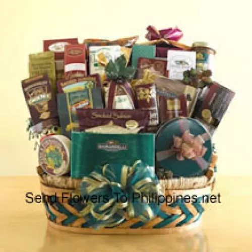 This enormous gift basket is an over-the-top Thanks Giving gift that is sure to leave a grand impression! When you need to send something that is truly memorable and is large enough to be enjoyed by a crowd, this gift basket is perfect. This sweet and savory selection features smoked salmon, crackers, cheese, assorted nuts, biscotti, Bavarian-style pretzels, cheese sticks, tortilla chips, salsa, cheese swirls, snack mix, a collection of cookies, caramel popcorn, Ghirardelli chocolate squares, a box of assorted Ghirardelli chocolates, a tin of chocolate-covered sandwich cookies, chocolate-dipped pretzels, chocolate nuggets, and hot cocoa mix. They won't know what to eat first! (Please Note That We Reserve The Right To Substitute Any Product With A Suitable Product Of Equal Value In Case Of Non-Availability Of A Certain Product)